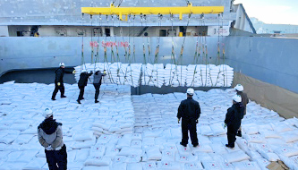 Loading bags of rice